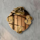 Dettaglio orologio specchio Benguiat finitura ambra