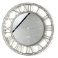 Vista frontale dell'orologio Axis 70 con numeri romani e quadrante in vetro specchio Crystal® fumé serigrafato in bianco. Base in ferro color fango. Diametro 70 cm. Prodotto da Arti&Mestieri.